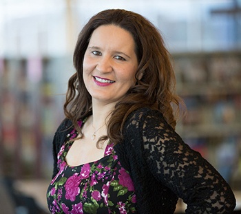 A photo of Jill Provoe smiling at the camera.